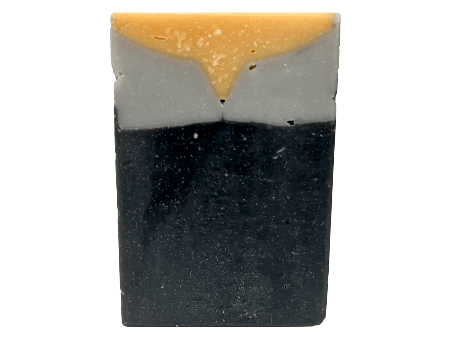 A bar of gold, grey and black soap inspired by the design of the uniforms work on the Star Trek: TNG era uniforms, as well as Deep Space Nine. This soap is scented with a fragrance called Blue Skies, in honor of Data's famous rendition of the song. It smells like clean cotton.
