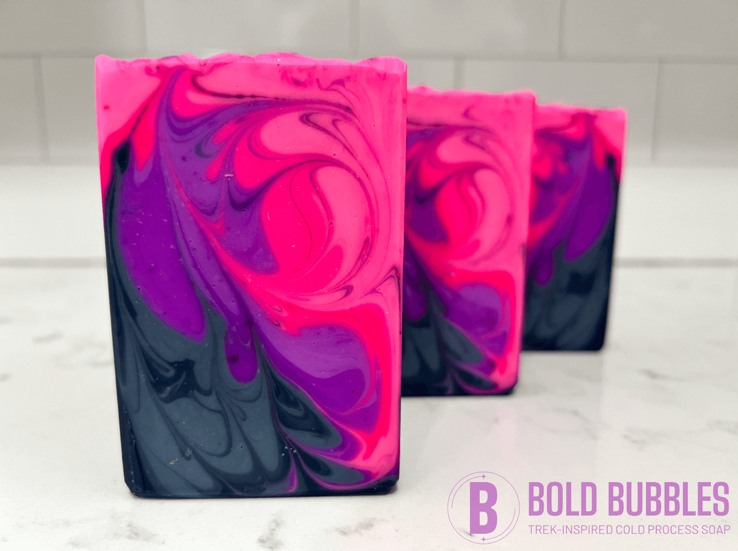 Bars of soap with swirled shades of purple, blue, and pink. The colors are inspired by the Mutara Nebula from Star Trek II: The Wrath of Khan.
