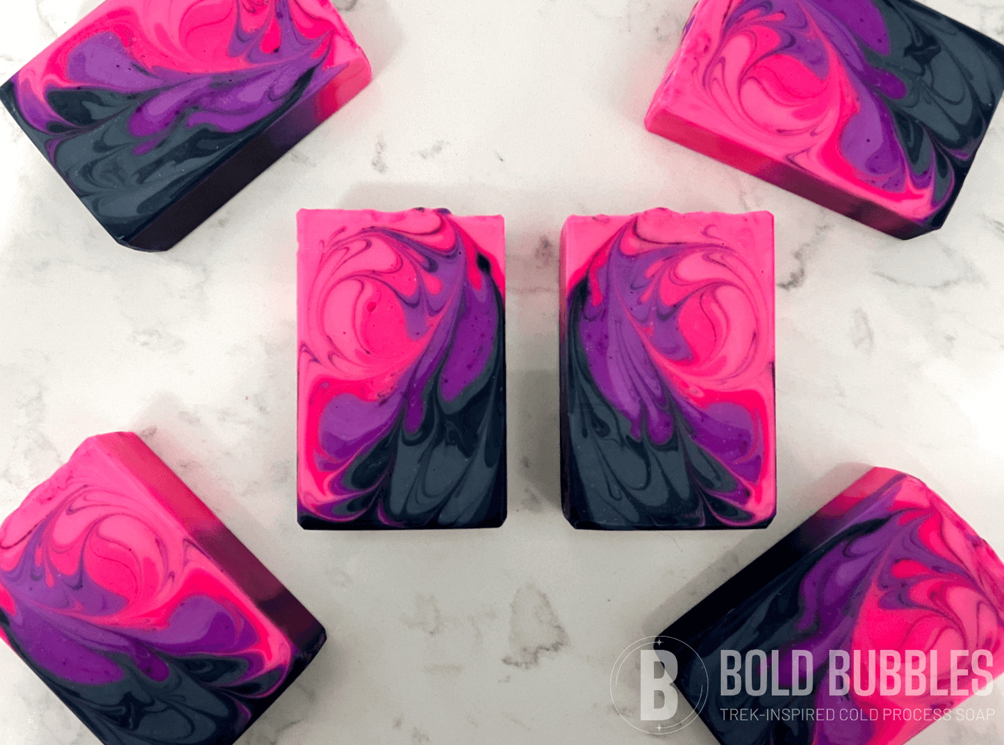 Bars of soap with swirled shades of purple, blue, and pink. The colors are inspired by the Mutara Nebula from Star Trek II: The Wrath of Khan.