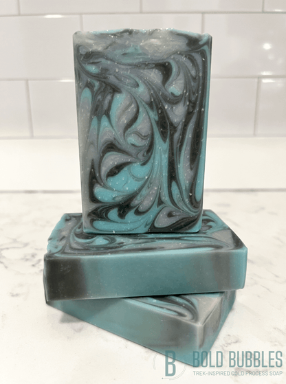 Inspired by Andoria, these blue, grey and white swirls smell like the airy and woodsy aura of waking up to a fresh layer of snow on crisp Christmas morning. If that sounds like something you love, this soap is for you!