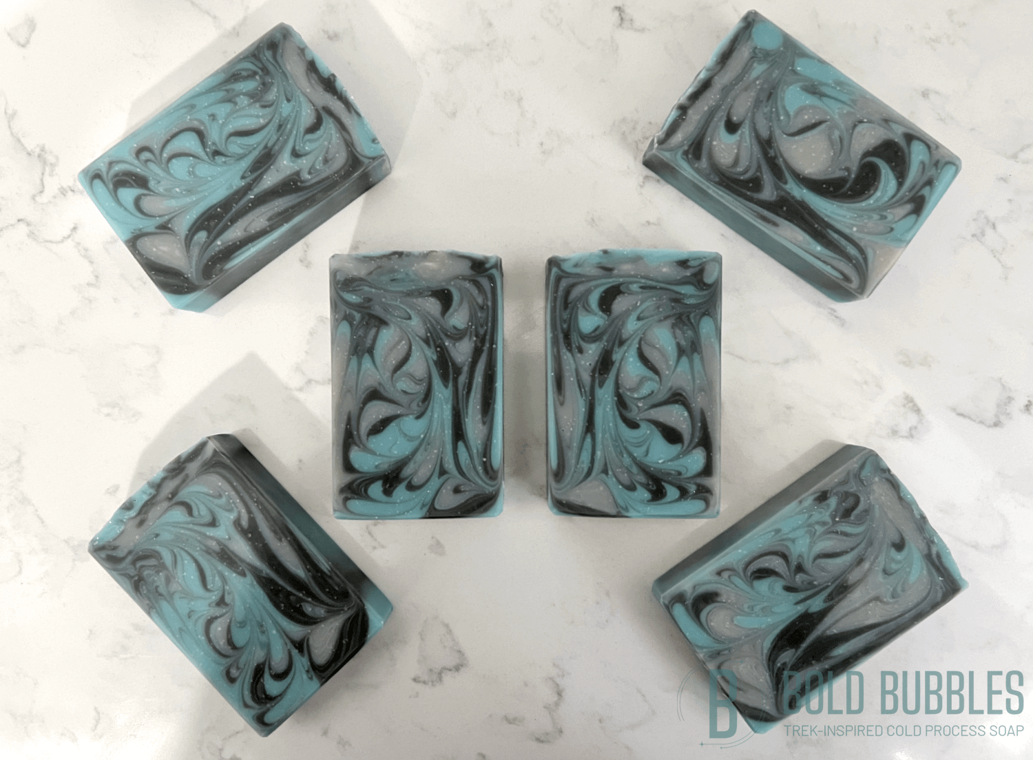 Inspired by Andoria, these blue, grey and white swirls smell like the airy and woodsy aura of waking up to a fresh layer of snow on crisp Christmas morning. If that sounds like something you love, this soap is for you!