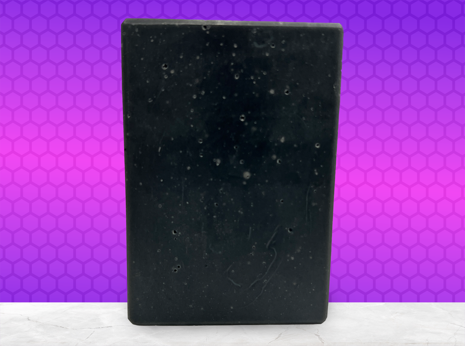 A black bar of activated charcoal soap inspired by the character Armus from Star Trek: TNG. 