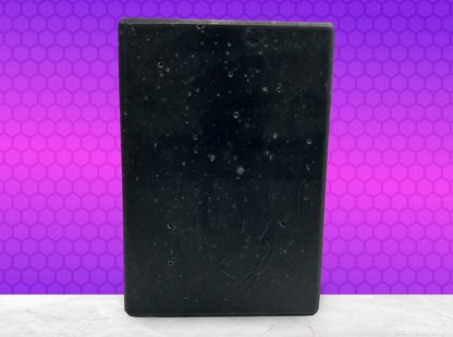 A black bar of activated charcoal soap inspired by the character Armus from Star Trek: TNG. 