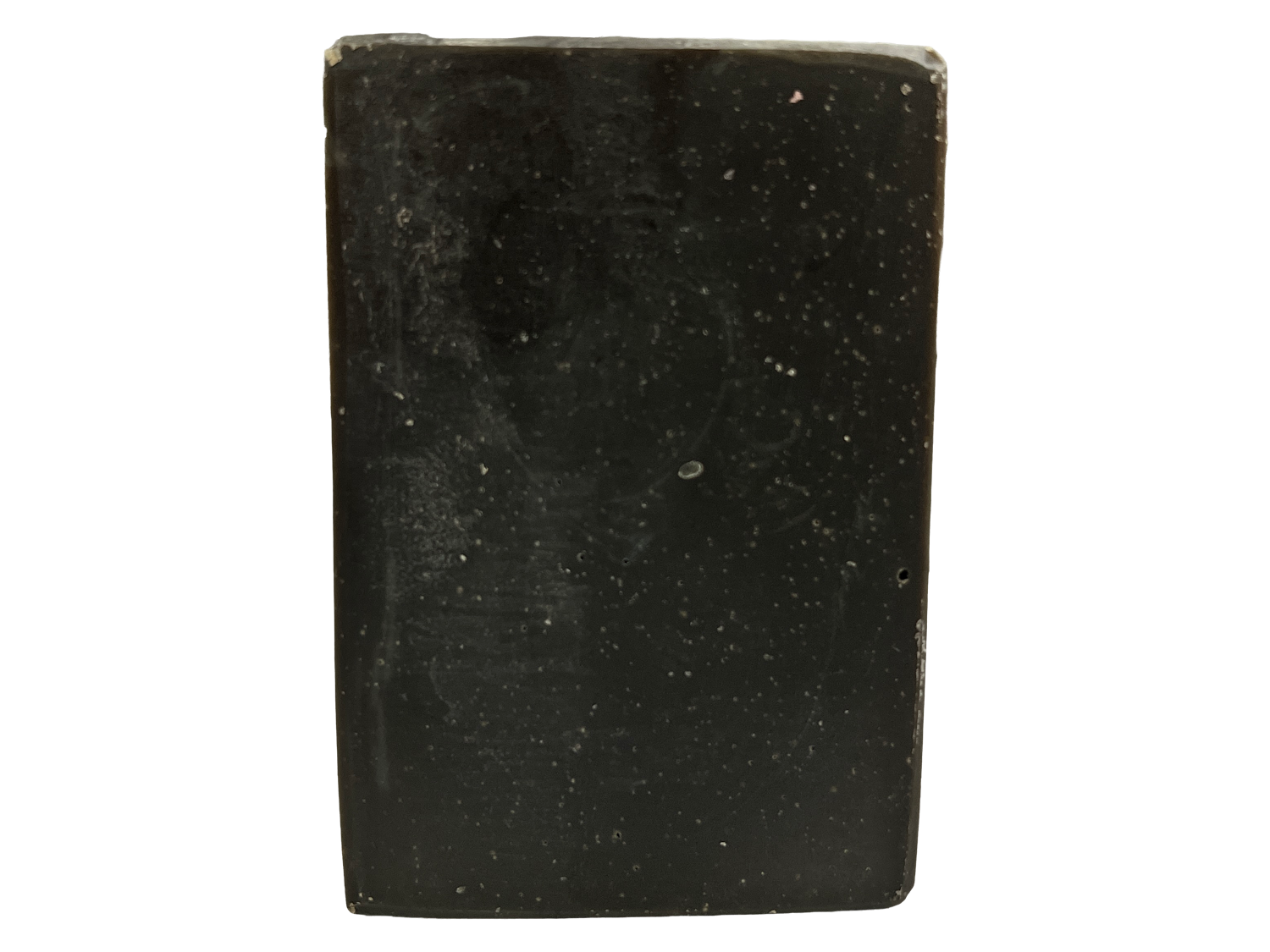 A black bar of pine tar soap inspired by the character Armus from Star Trek: TNG, which looked like a tar pit. The soap is scented with eucalyptus essential oil.
