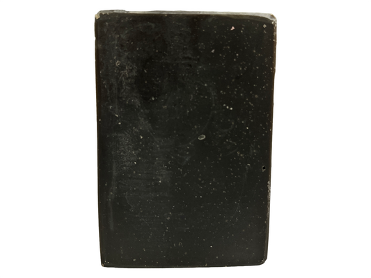 A black bar of pine tar soap inspired by the character Armus from Star Trek: TNG, which looked like a tar pit. The soap is scented with eucalyptus essential oil.