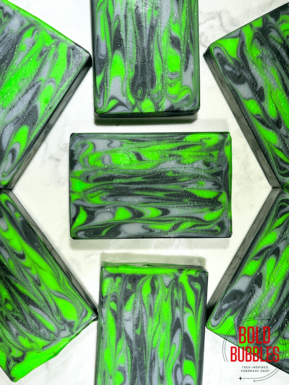 Vertical swirls of neon green, black and grey soap inspired by the Borg in Star Trek.