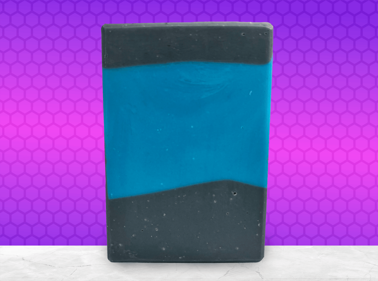 A bar of blue and black soap inspired by the design of the iconic uniforms worn on Star Trek: The Next Generation. The scent is wild rose in honor of Dr. Beverly Crusher.