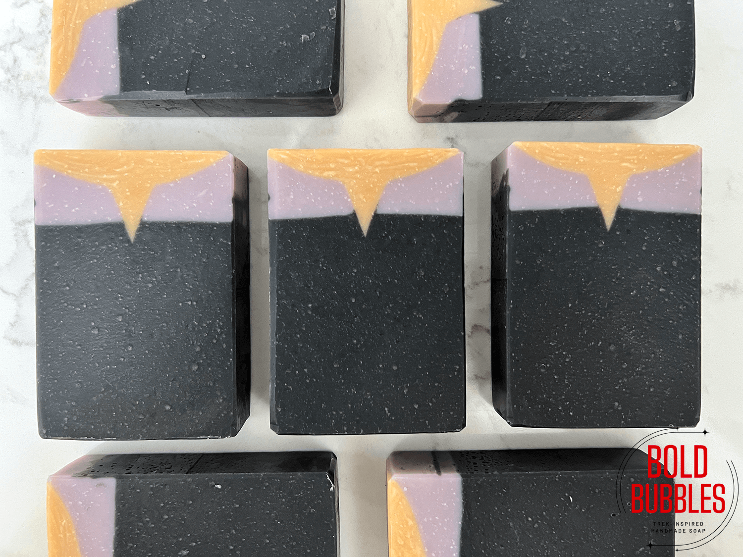 Soap designed in the late '90s-style Star Trek uniforms with grey on top and a yellow shirt underneath. This soap is inspired by Data, and it has a clean cotton scent that's called "Blue Skies."