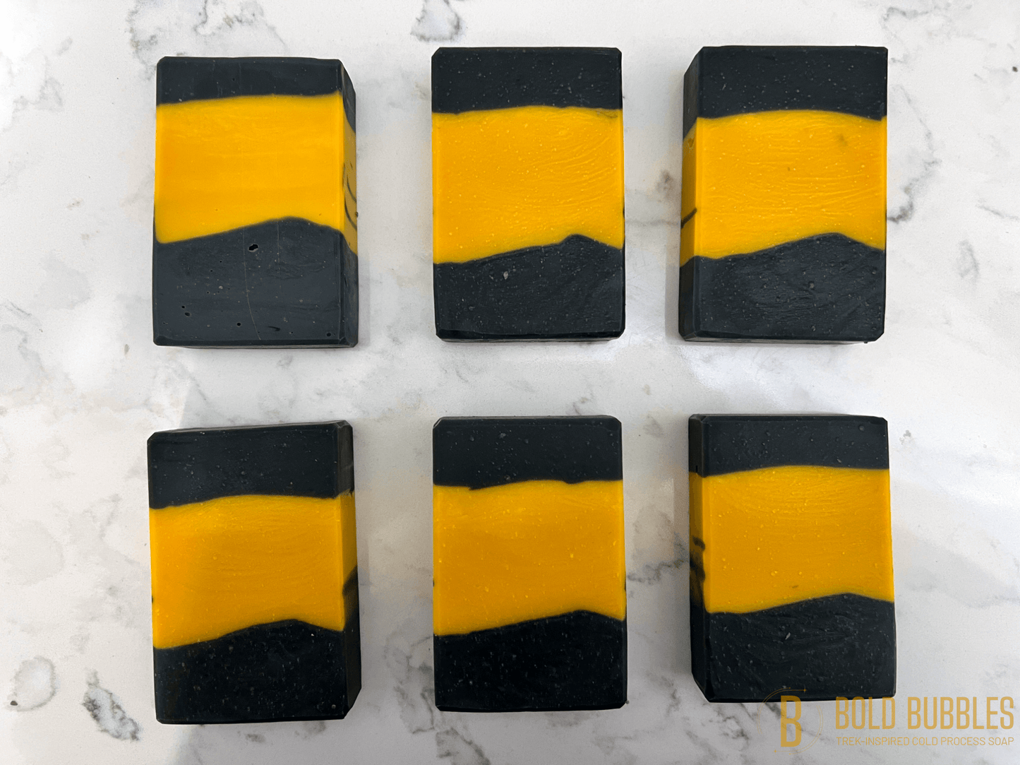 Gold bars of soap inspired by the uniform worn by Data in Star Trek: The Next Generation. They are imperfect in design, and therefore being sold at a discount.