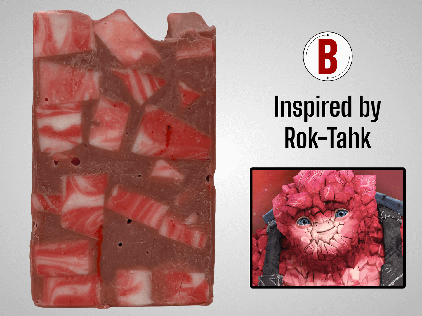 A bar of soap made up of red and white cubes, with brick red filling in the gaps. The soap is inspired by Rok-Tahk, the Brikar, from Star Trek: Prodigy. It smells like red berries and rhubarb.