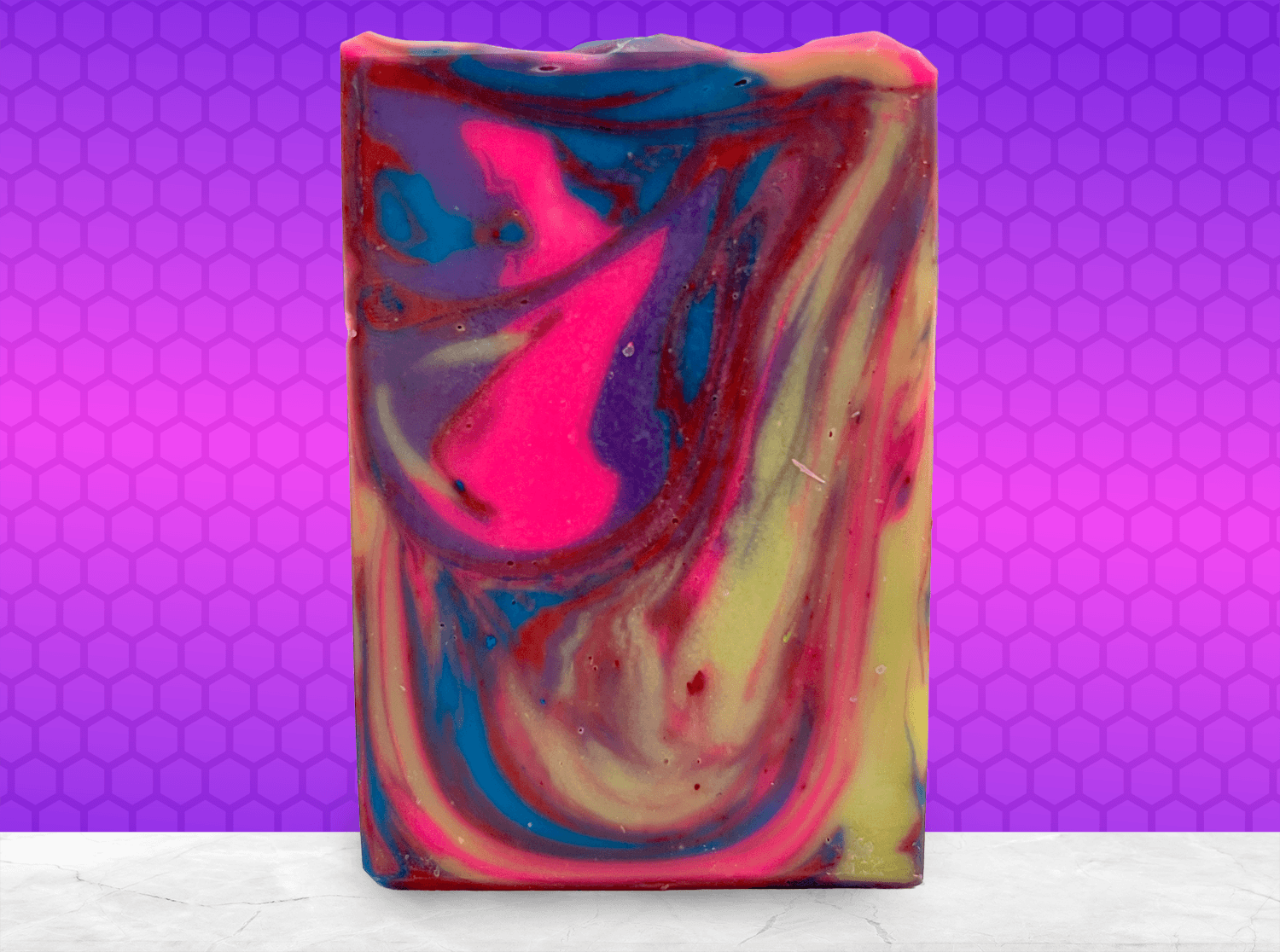 The swirled colors of this soap are inspired by the bright colors of Jake Sisko's attire on Star Trek: Deep Space Nine. The scent is "orange paradise," a ray of sunshine for your sonic shower!