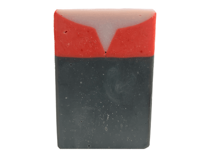 A black, red, and purplish-grey bar of soap inspired by Captain Kathryn Janeway from Star Trek: Voyager. It is scented with an espresso martini fragrance.