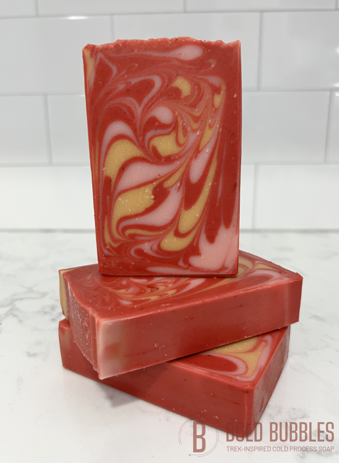 Red, pink and gold swirled soap with a warm cinnamon scent. It is inspired by Kira Nerys from Star Trek: Deep Space Nine.