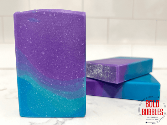 A bar of soap with a gradient that starts with purple on top and blue at bottom. The colors are inspired by Murf on Star Trek: Prodigy.