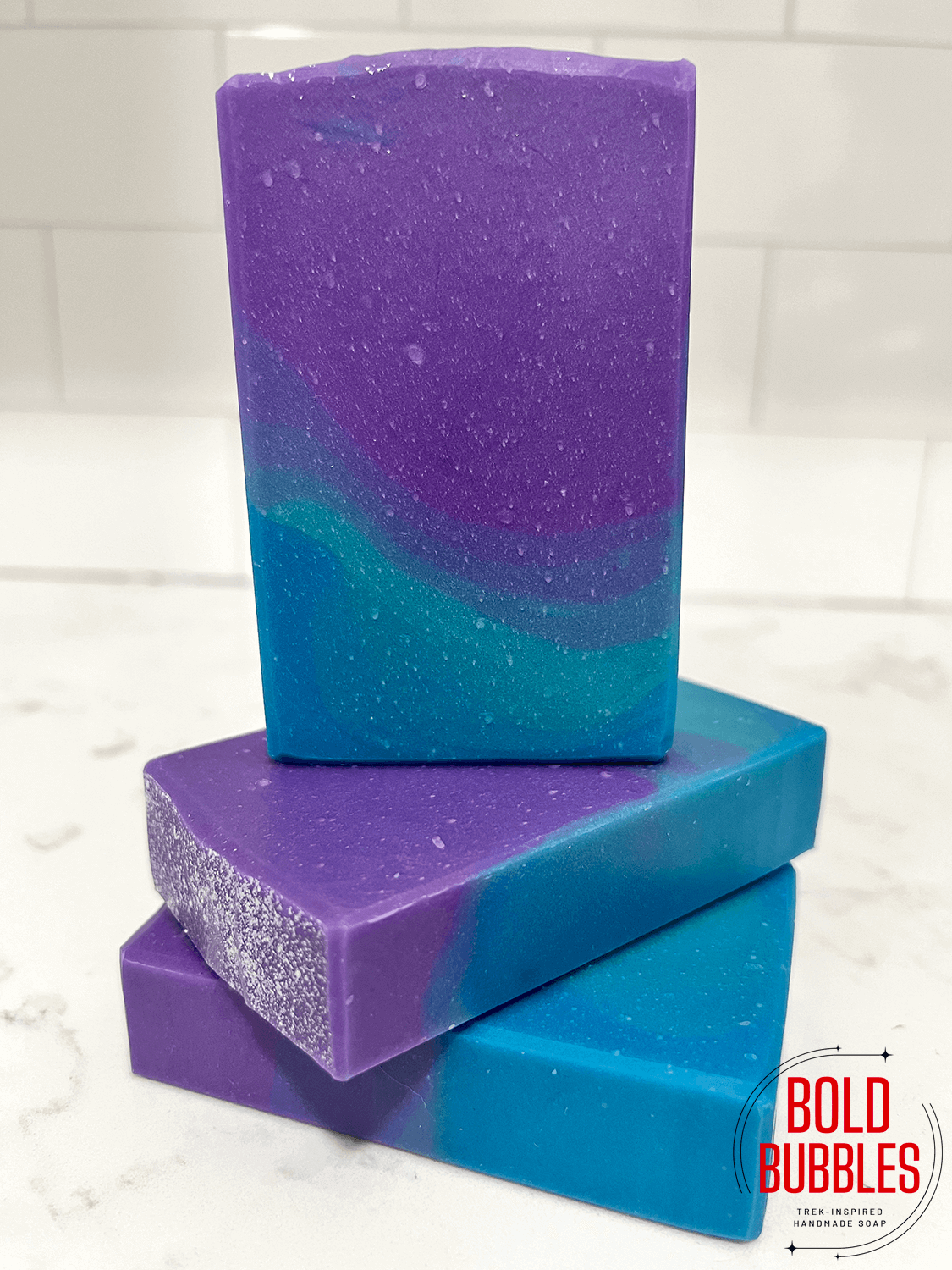 A bar of soap with a gradient that starts with purple on top and blue at bottom. The colors are inspired by Murf on Star Trek: Prodigy.