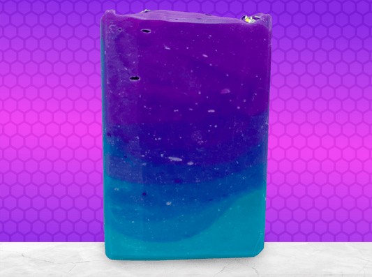 Gradient purple to blue soap bar on a white background. The colors are inspired by Murf from Star Trek: Prodigy, and the scent is fresh mango.