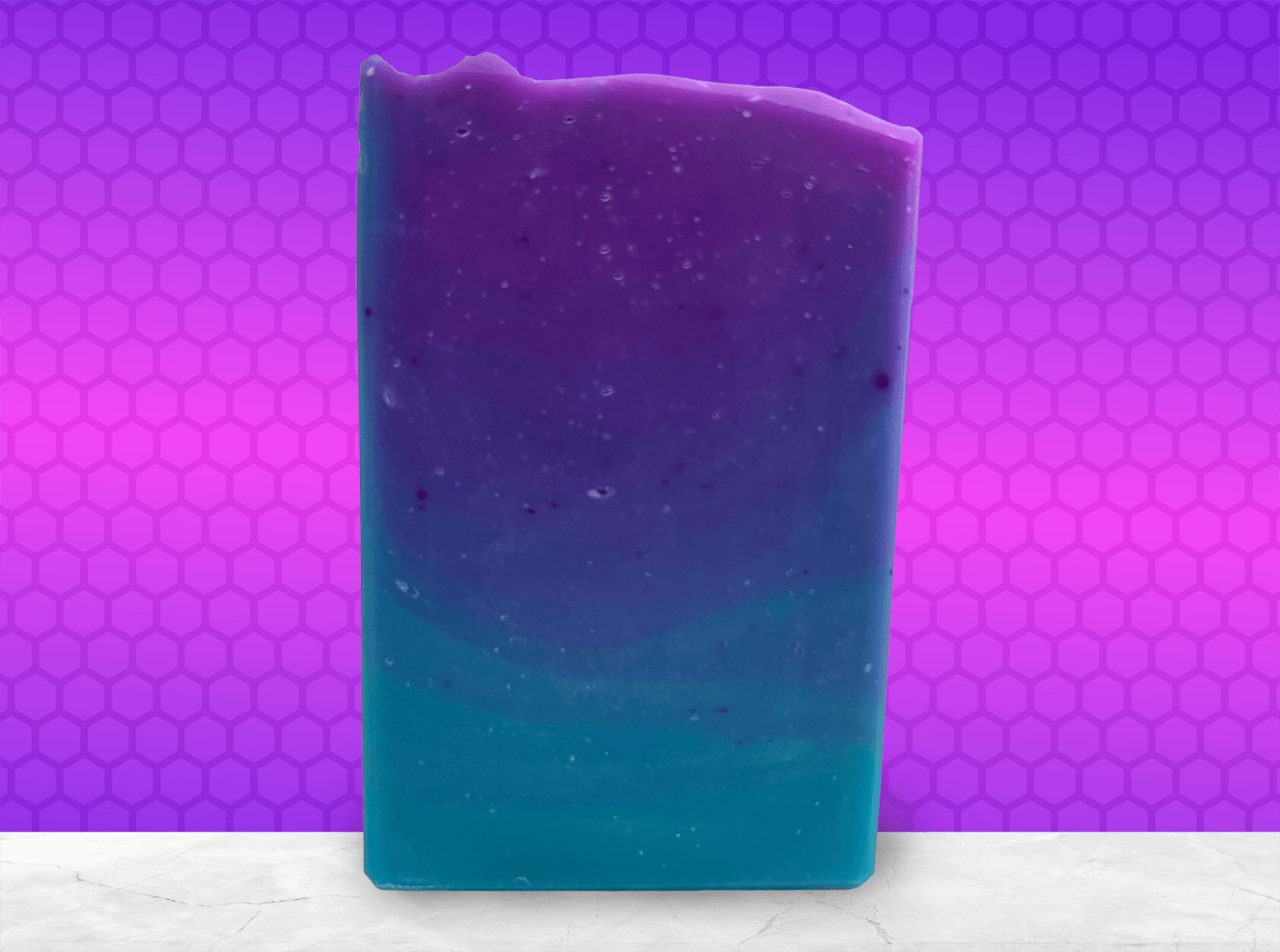 Gradient purple to blue soap bar on a white background. The colors are inspired by Murf from Star Trek: Prodigy, and the scent is fresh mango.