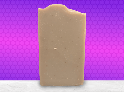 A bar of brownish-colored soap made with colloidal oats. This bar is scented with an oatmeal, milk and honey fragrance.