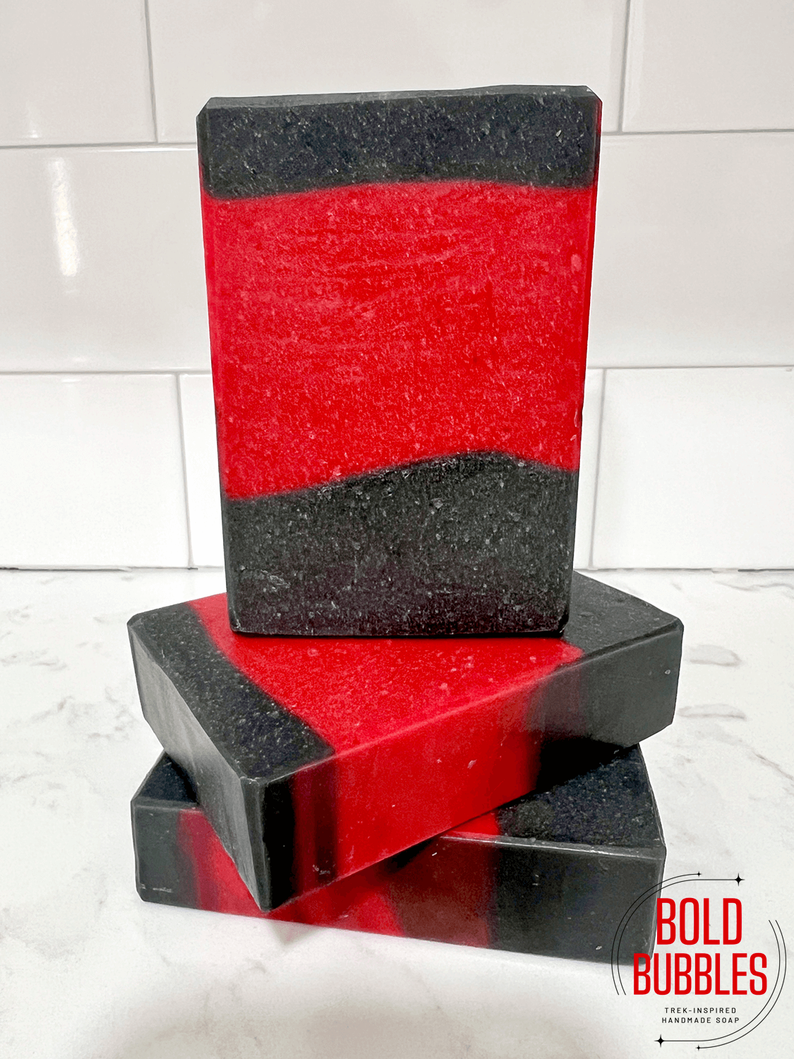A red and black bar of soap inspired by the iconic Star Trek TNG uniform. This soap is scented with an earl grey tea fragrance in honor of Captain Picard.