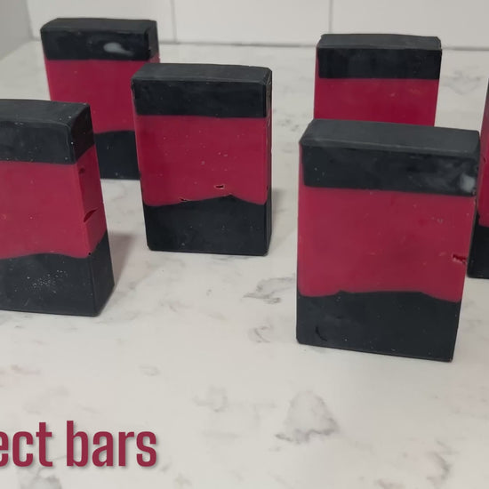 Imperfect bars of red and black soap inspired by the uniforms worn on Star Trek: The Next Generation. These bars are scented with sensuous sandalwood, in honor of Commander Riker.