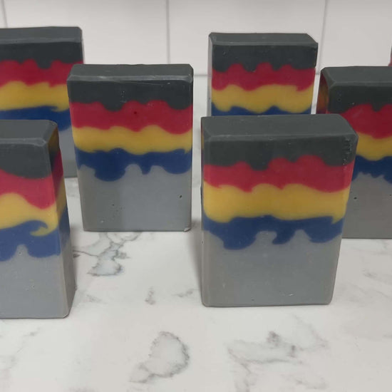 Bars of soap inspired by the grey, blue, yellow, and red sweater Wesley Crusher wore in Star Trek: The Next Generation. The scent is a dynamic unisex blend of citrus, floral, and earthy notes.
