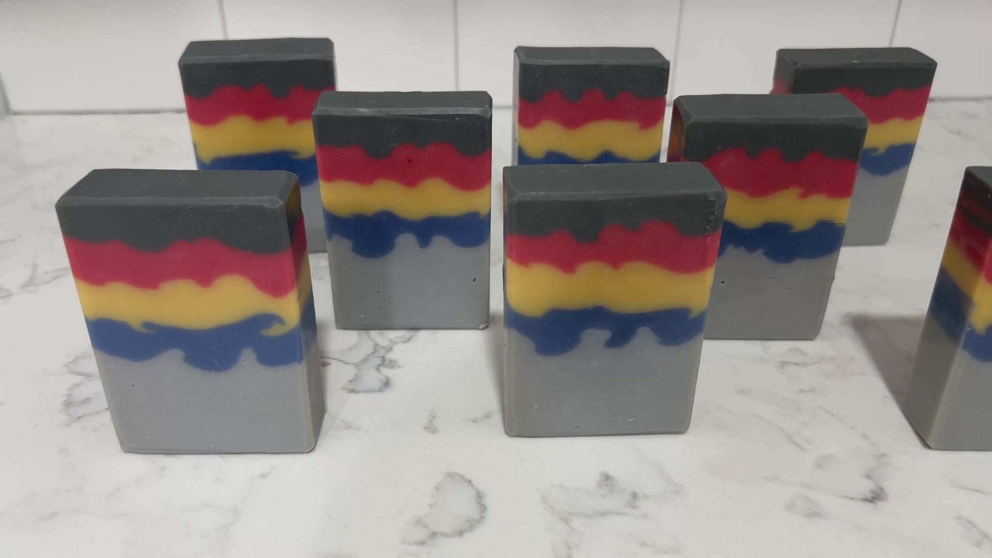 Bars of soap inspired by the grey, blue, yellow, and red sweater Wesley Crusher wore in Star Trek: The Next Generation. The scent is a dynamic unisex blend of citrus, floral, and earthy notes.