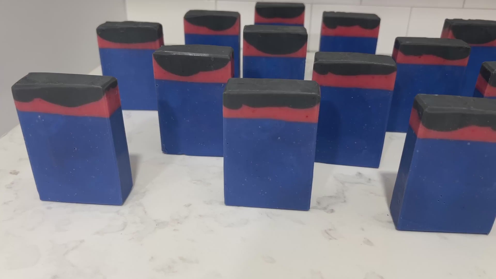 Blue, red and black bars of soap inspired by the uniforms work by the crew on Star Trek: Enterprise. The scent is salt water, a refreshing scent inspired by Jonathan Archer's love for water polo.