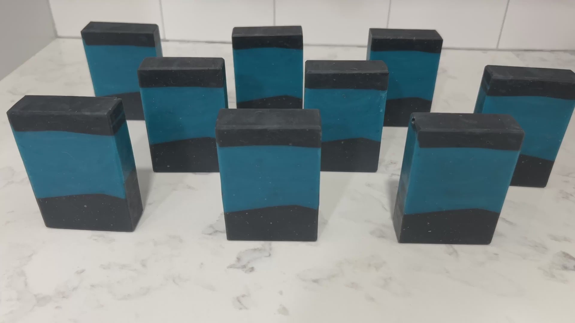 Bars of blue and black soap inspired by the iconic uniforms worn on Star Trek: The Next Generation. The scent is mint frosting, AKA spearmint, in honor of the time Troi became a cellular peptide cake with mint frosting.