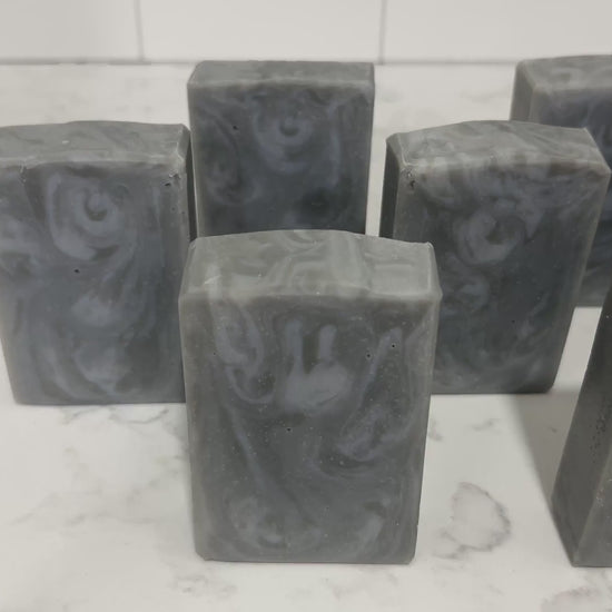 Swirled bars of unscented soap with two shades of grey. They are inspired by Garak from Star Trek: Deep Space Nine.