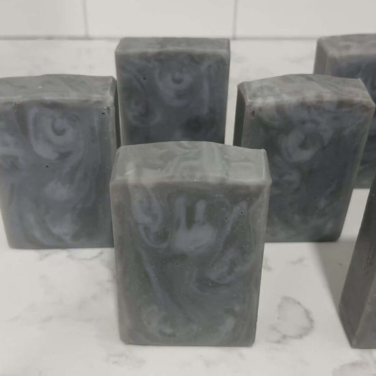 Swirled bars of unscented soap with two shades of grey. They are inspired by Garak from Star Trek: Deep Space Nine.