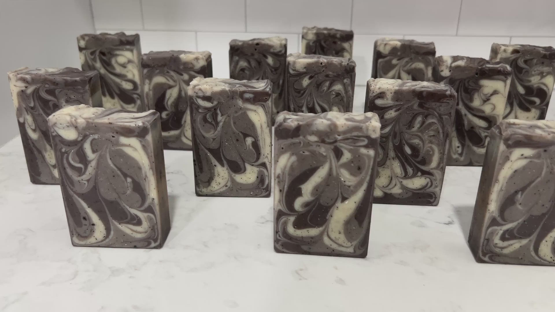 Bars of coffee soap with various shades of brown and cream-colored swirls. It smells like a cafe latte, and it is inspired by Captain Janeway's obsession with coffee on Star Trek: Voyager and Star Trek: Prodigy.