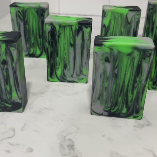 Vertical swirls of green, black and gray make up this soap inspired by the Borg from Star Trek TNG, Voyager, and more. The scent is a tempting unisex blend of earthy and floral notes. Do it: tempt your flesh!