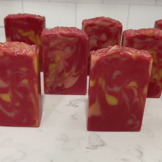 Bars of soap with swirls of red, gold, and cantalouple, inspired by the uniform Kira Nerys wore on Star Trek: Deep Space Nine. The scent is sugar and spice. 