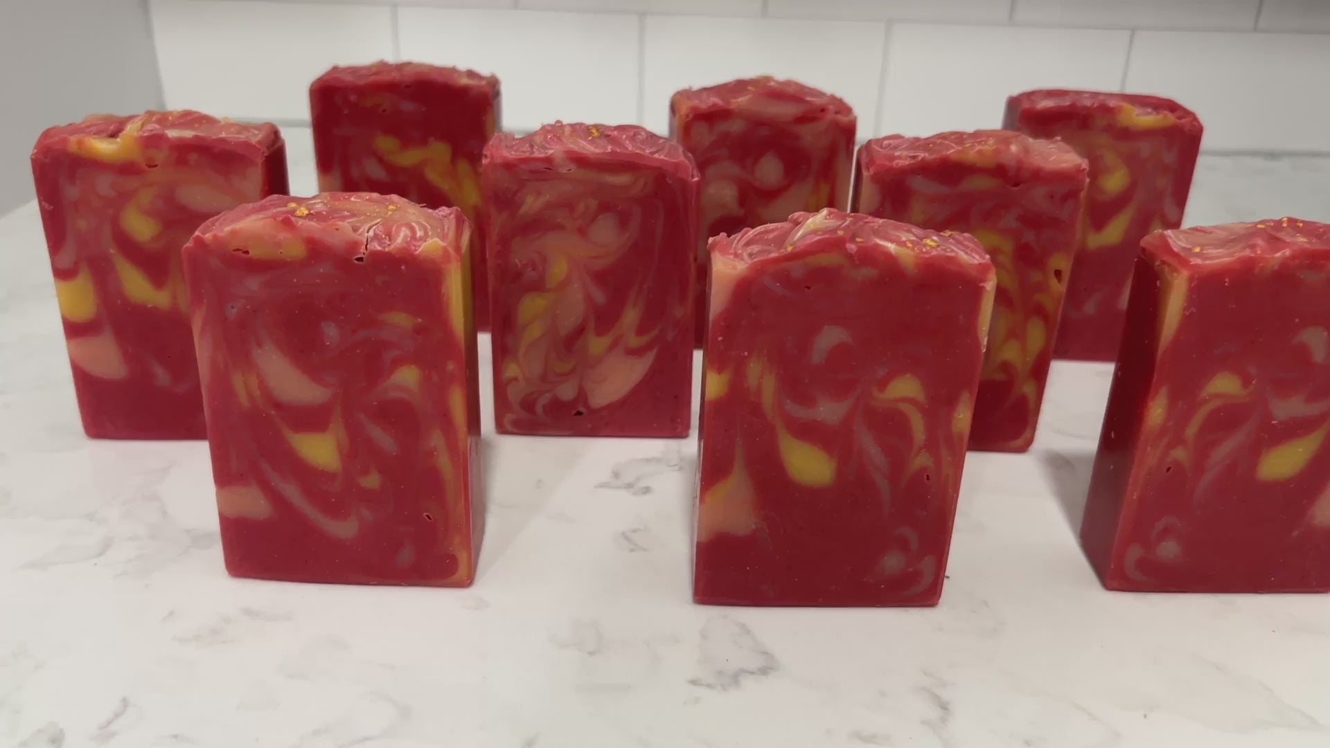 Bars of soap with swirls of red, gold, and cantalouple, inspired by the uniform Kira Nerys wore on Star Trek: Deep Space Nine. The scent is sugar and spice. 