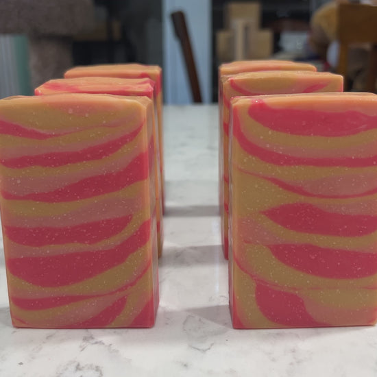 Handmade cold process soap with layers of red, orange, and gold, inspired by the Samarian Sunset on Star Trek: The Next Generation.