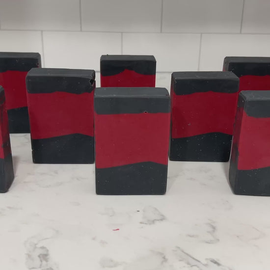 Bars of red and black soap inspired by the iconic uniforms worn on Star Trek: The Next Generation. The scent is Earl Grey tea, Captain Picard's favorite beverage.