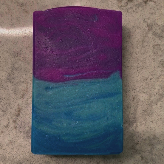 Purple and blue soap in honor of Murf on Star Trek: Prodigy that glows in the dark.