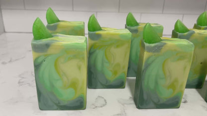 Bars of seven-color green swirled soap made with an intoxicating fresh lime fragrance, and a little lime garnish on top. They are inspired by the Seven of Limes drink mentioned in Star Trek: Discovery.