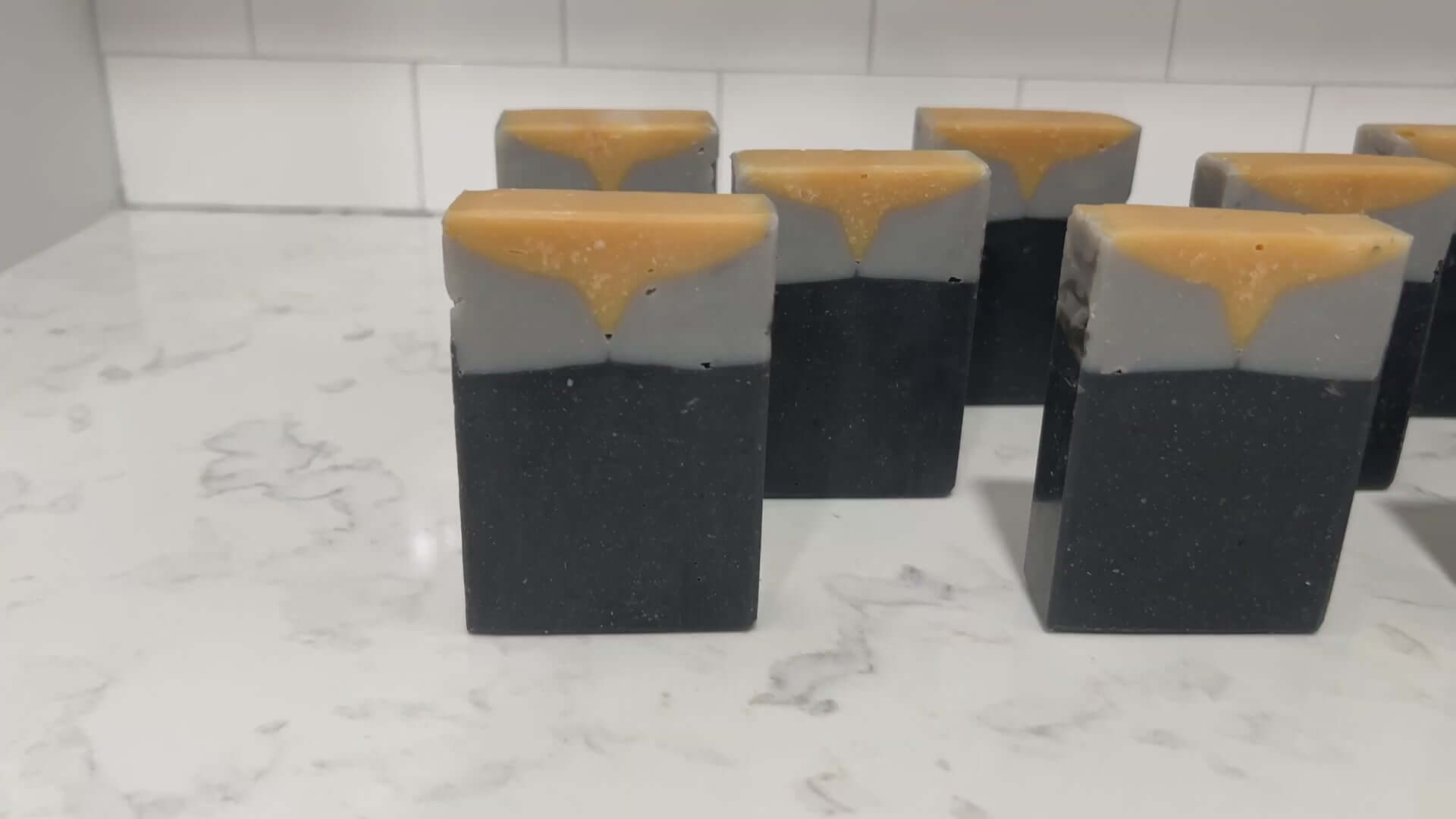 Bars of gold, grey and black soap inspired by the design of the uniforms work on the Star Trek: TNG era uniforms, as well as Deep Space Nine. This soap is scented with a fragrance called Blue Skies, in honor of Data's famous rendition of the song. It smells like clean cotton.