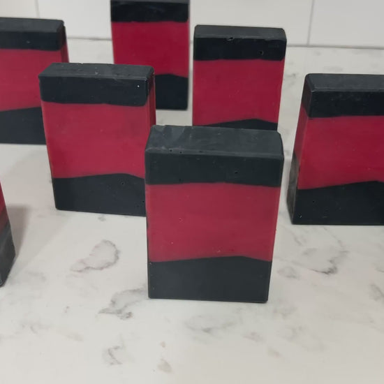 Bars of red and black soap inspired by the iconic uniforms worn on Star Trek: The Next Generation. The scent is Earl Grey tea, Captain Picard's favorite beverage.