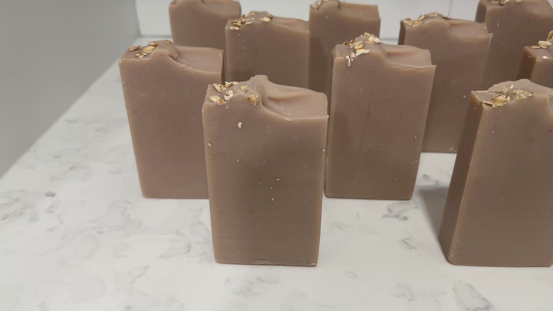 Bars of brownish-colored soap made with colloidal oats. This bar is scented with an oatmeal, milk and honey fragrance.