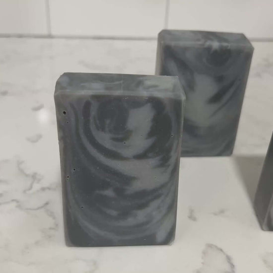 Swirled bars of unscented soap with two shades of grey. It is inspired by Garak from Star Trek: Deep Space Nine.