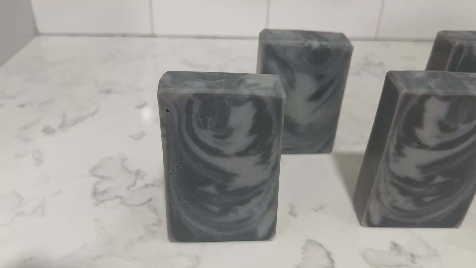 Swirled bars of unscented soap with two shades of grey. It is inspired by Garak from Star Trek: Deep Space Nine.