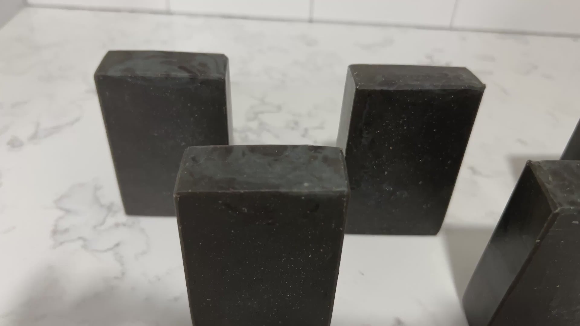 Bars of black pine tar soap inspired by the character Armus from Star Trek: TNG, which looked like a tar pit. The soap is scented with a blend of eucalyptus and cedar essential oils.