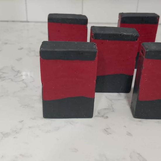 Bars of red and black soap inspired by the uniforms worn on Star Trek: The Next Generation. These bars are scented with sensuous sandalwood, in honor of Commander Riker.
