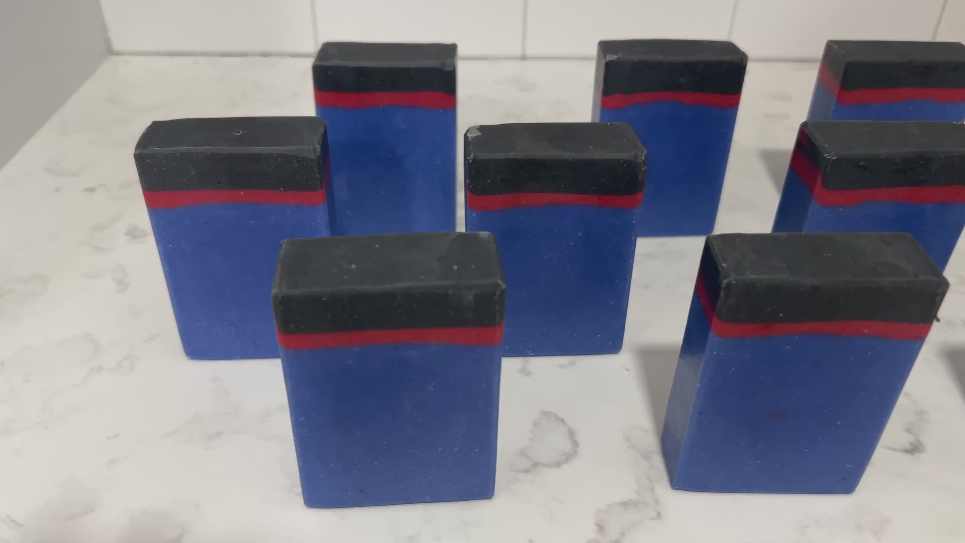 Blue, red and black bars of soap inspired by the uniforms work by the crew on Star Trek: Enterprise. The scent is sea water, a refreshing scent inspired by Jonathan Archer's love for water polo.