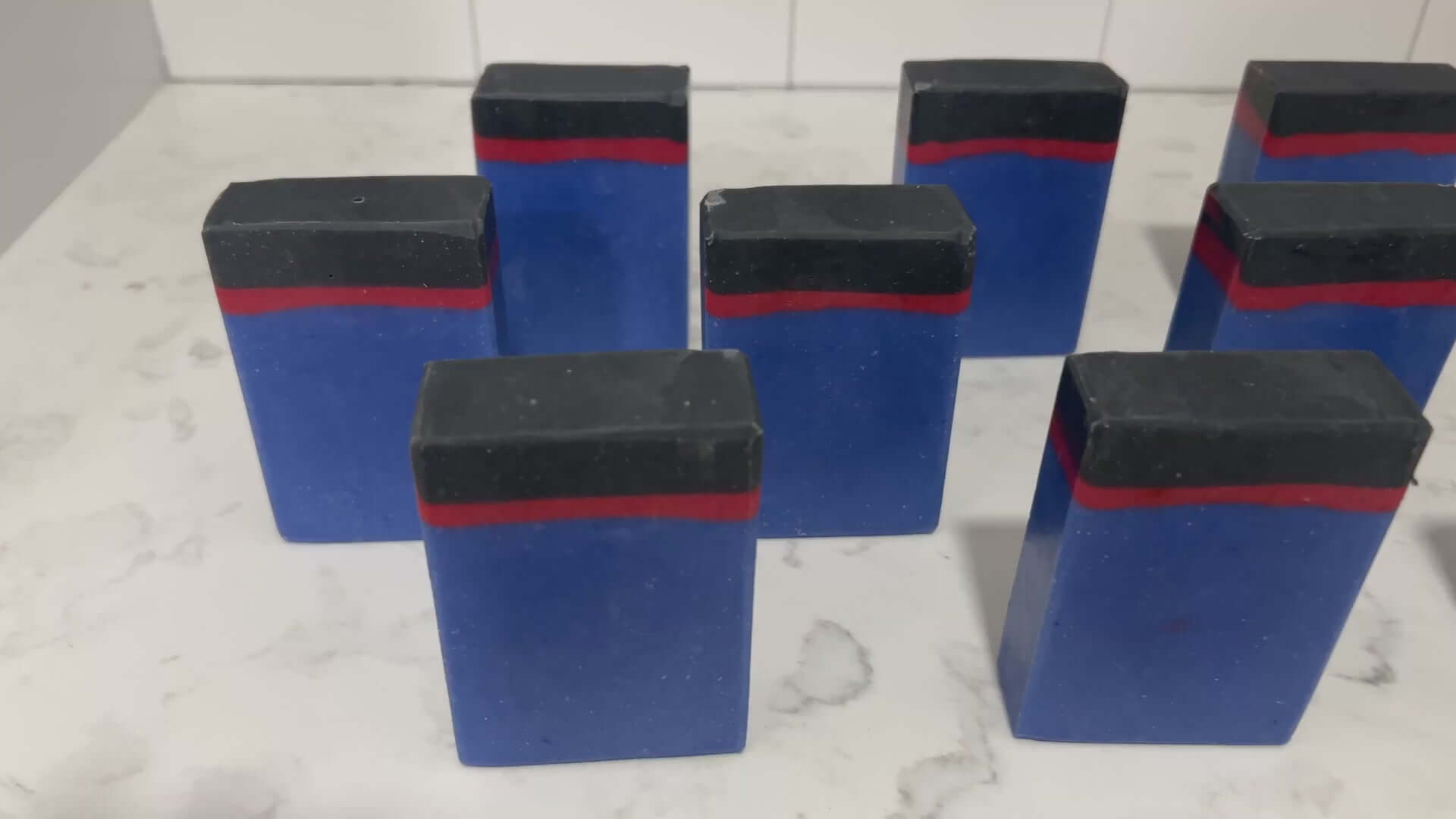 Blue, red and black bars of soap inspired by the uniforms work by the crew on Star Trek: Enterprise. The scent is sea water, a refreshing scent inspired by Jonathan Archer's love for water polo.