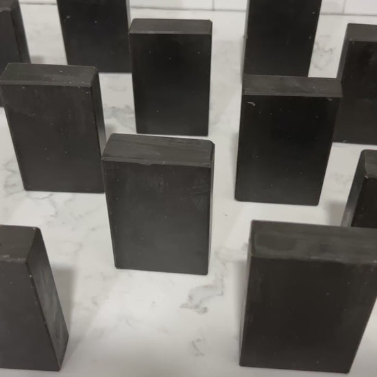 Bars of pine tar soap inspired by the character Armus from Star Trek: TNG, which looked like a tar pit. The soap is scented with eucalyptus essential oil.