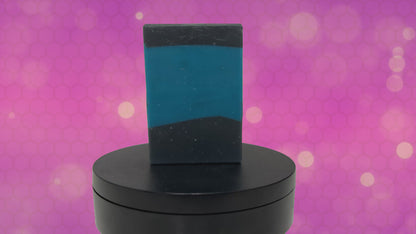 A bar of blue and black soap inspired by the iconic uniforms worn on Star Trek: The Next Generation. The scent is mint frosting, AKA spearmint, in honor of the time Troi became a cellular peptide cake with mint frosting.
