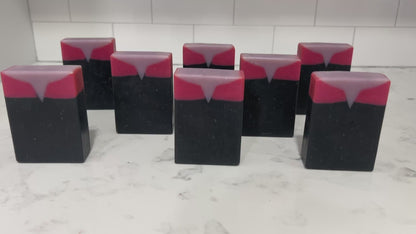 Bars of black, red, and purplish-grey soap inspired by Captain Kathryn Janeway from Star Trek: Voyager. It is scented with an espresso martini fragrance.